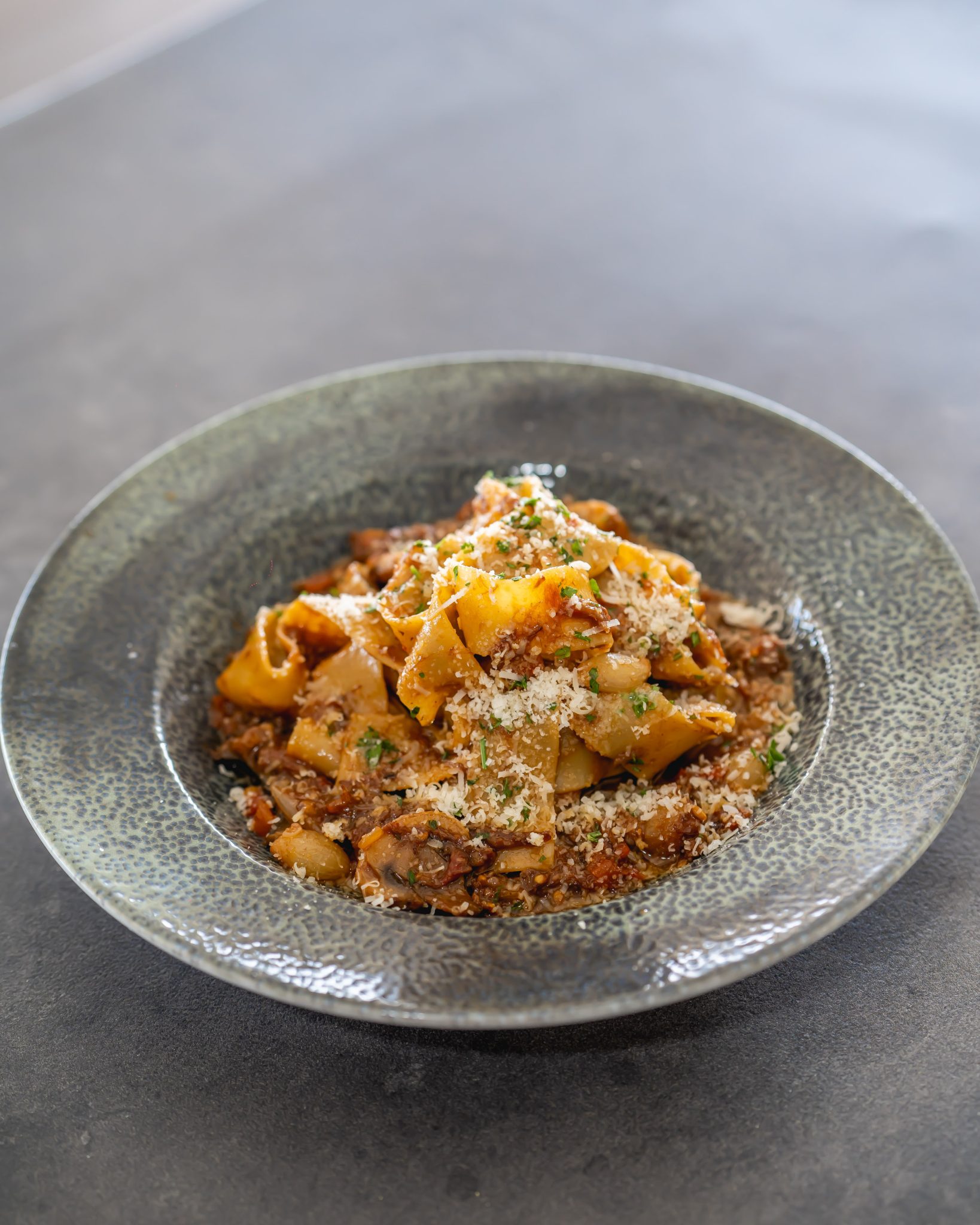 Lamb Ragu Pappardelle cherry tomatoes, mushrooms, parmesan